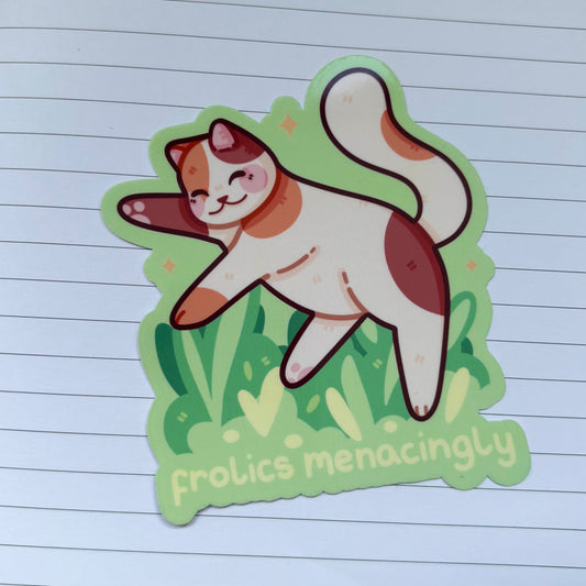 Frolics Menacingly Calico Cat