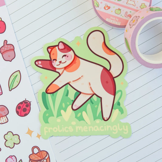 Frolics Menacingly Calico Cat